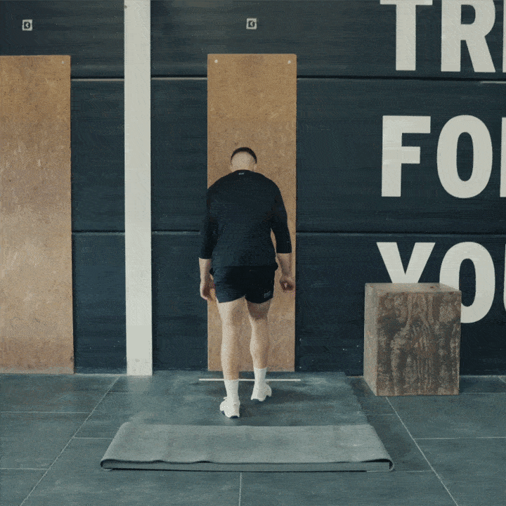 GIF of athlete doing handstand push-ups with Minimal 1.0 Velites Ivory White shoes showing double-density heel