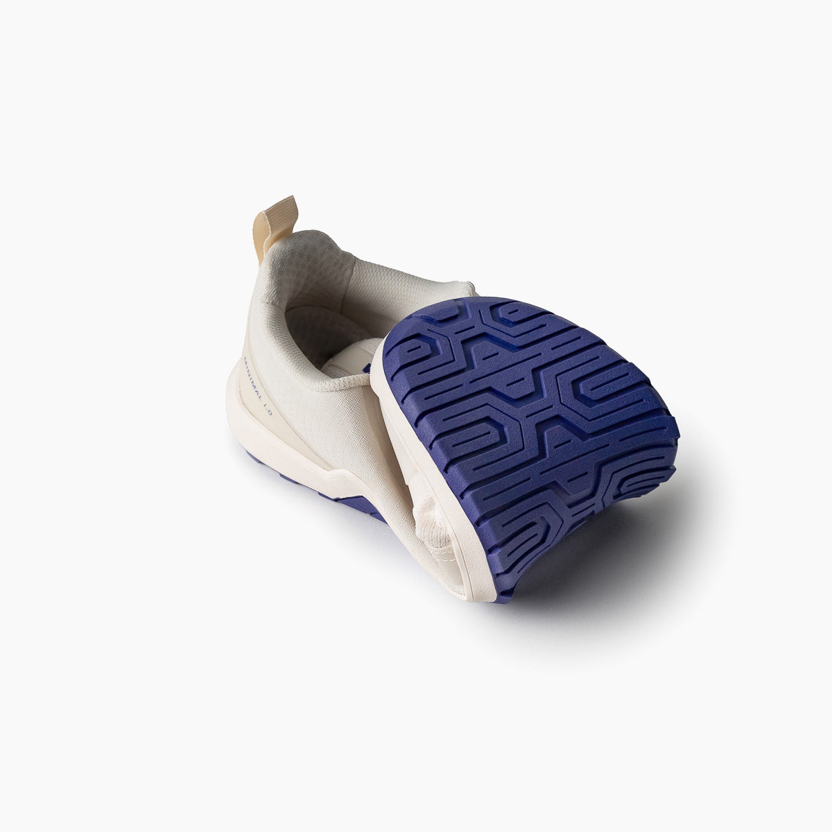 Barefoot shoes Minimal 1.0 Velites Ivory White folded showing ultra flexible textured purple sole back view